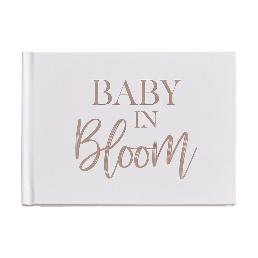 Baby in bloom guest book flatlay